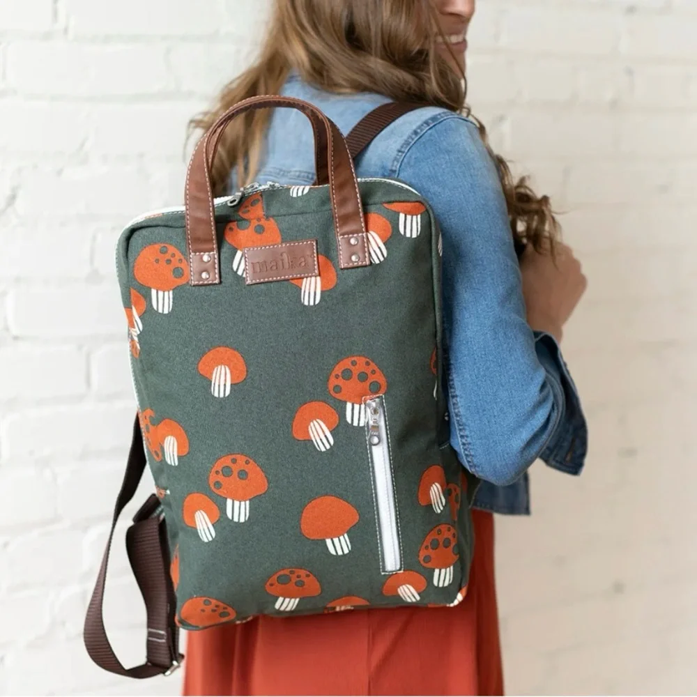 Marika Green and Orange Mushroom Laptop Backpack